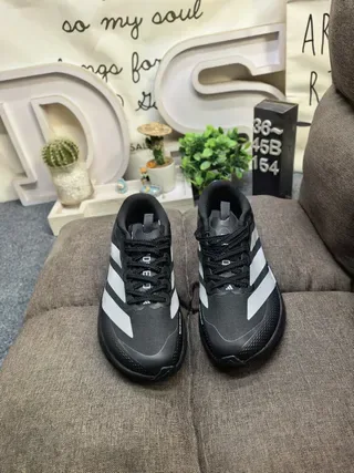 Adidas Black and Silver Three-Stripe Lifestyle Sneakers 10