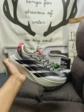 Adidas Black and Silver Three-Stripe Lifestyle Sneakers 15