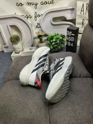 Adidas Black and Silver Three-Stripe Lifestyle Sneakers 16