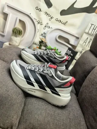 Adidas Black and Silver Three-Stripe Lifestyle Sneakers 17