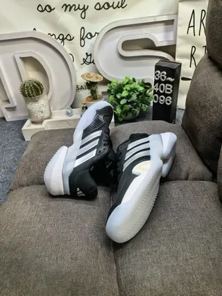 Adidas Black and Silver Three-Stripe Mesh Training Sneakers 6