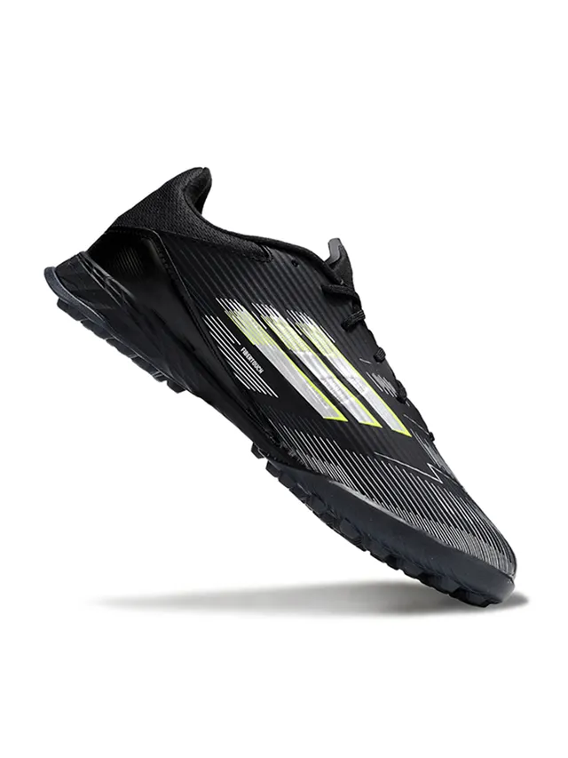 Adidas Chaussures de football turf noir jaune à coupe basse upper synthétique overlay texturé avec relief 5