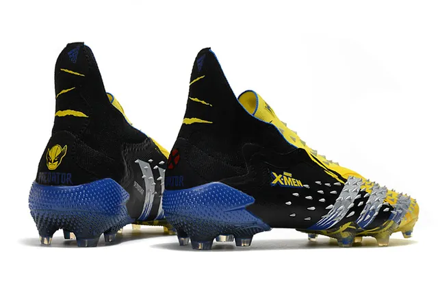 Adidas Sapatos de futebol preto e amarelo com overlay de anteiro com espigões, colar tipo meia, para terreno firme 7