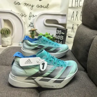 Adidas Chaussures de course vert bleu plaque de carbone silhouette de course gradient menthe à gris sur l'empeigne