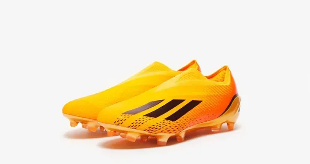 Adidas برتقالي ذهبي وجه الجوارب المشبكة كعب معدني أرض صلبة أحذية كرة القدم 9