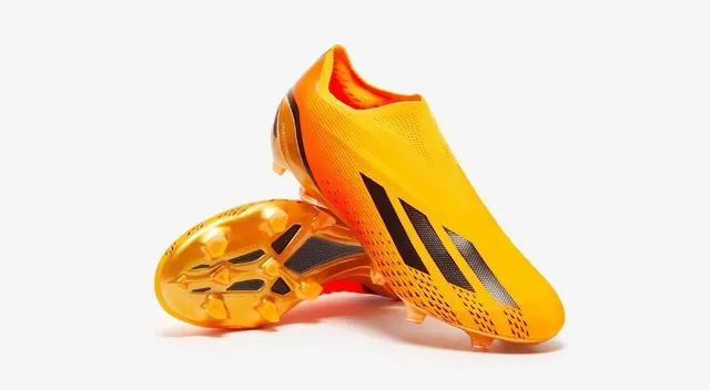 Adidas برتقالي ذهبي وجه الجوارب المشبكة كعب معدني أرض صلبة أحذية كرة القدم 14