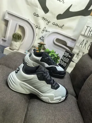 Adidas White and Black Three-Stripe Lifestyle Sneakers 9