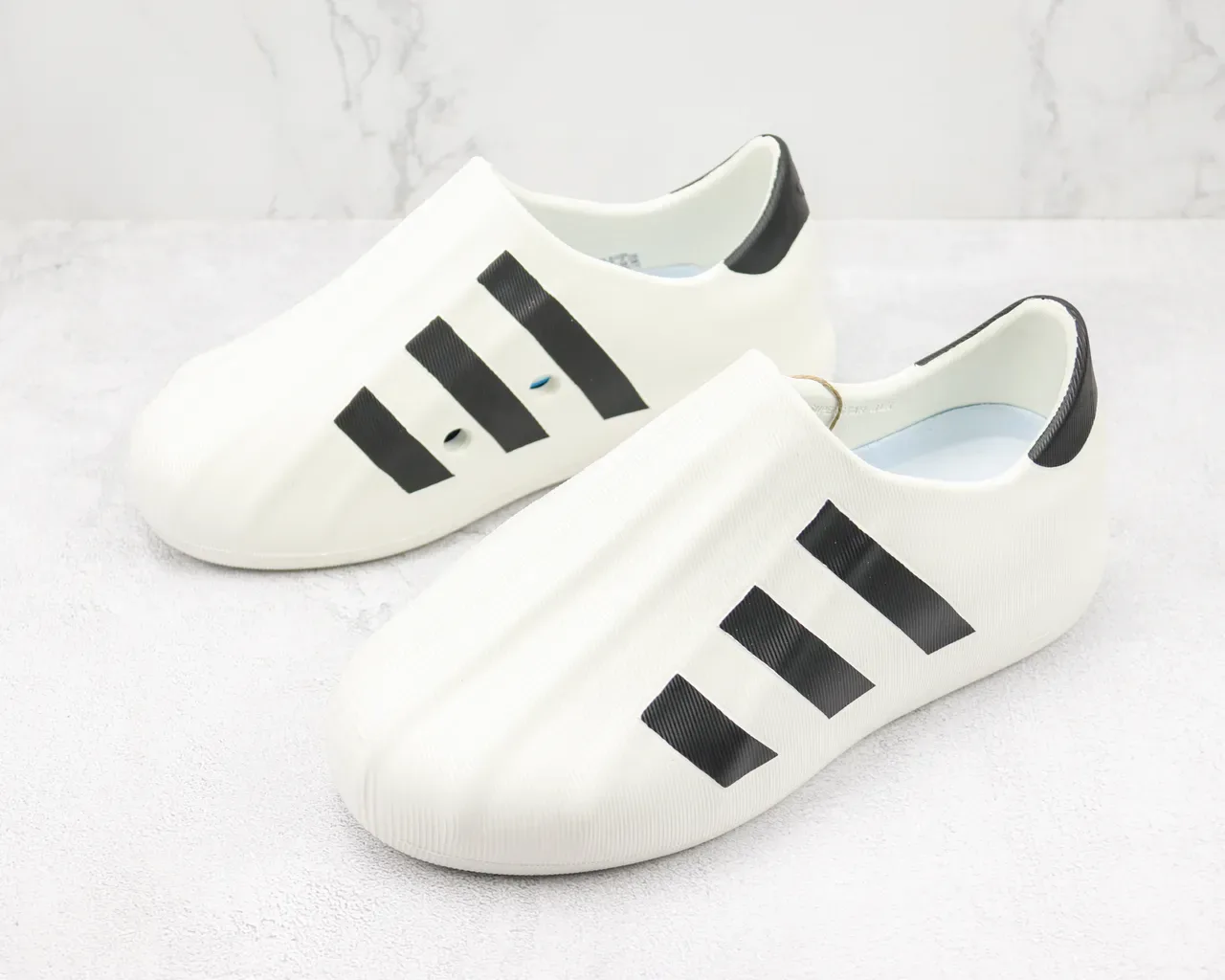 Adidas White Black Ribbed Monochrome Upper Slip-On Silhouette Sneakers 4