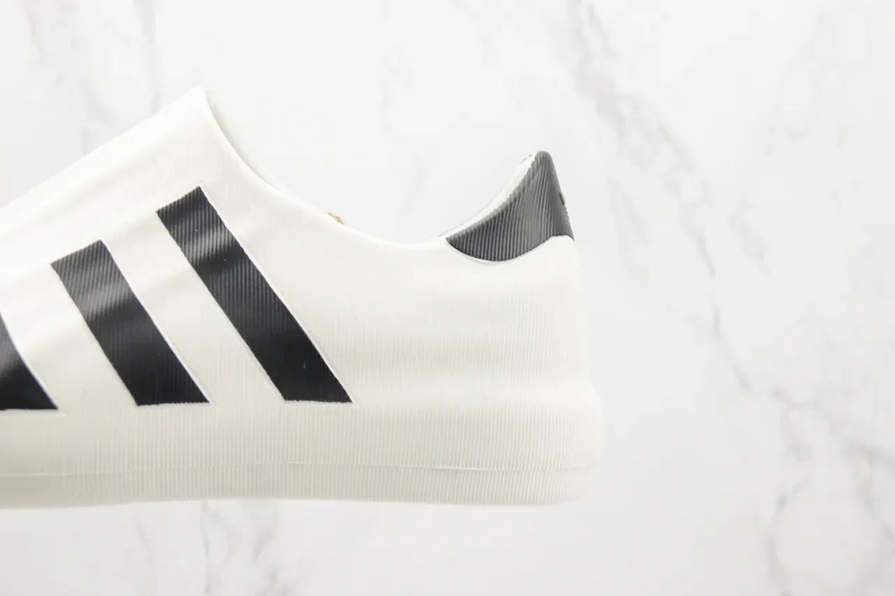 Adidas White Black Ribbed Monochrome Upper Slip-On Silhouette Sneakers 7