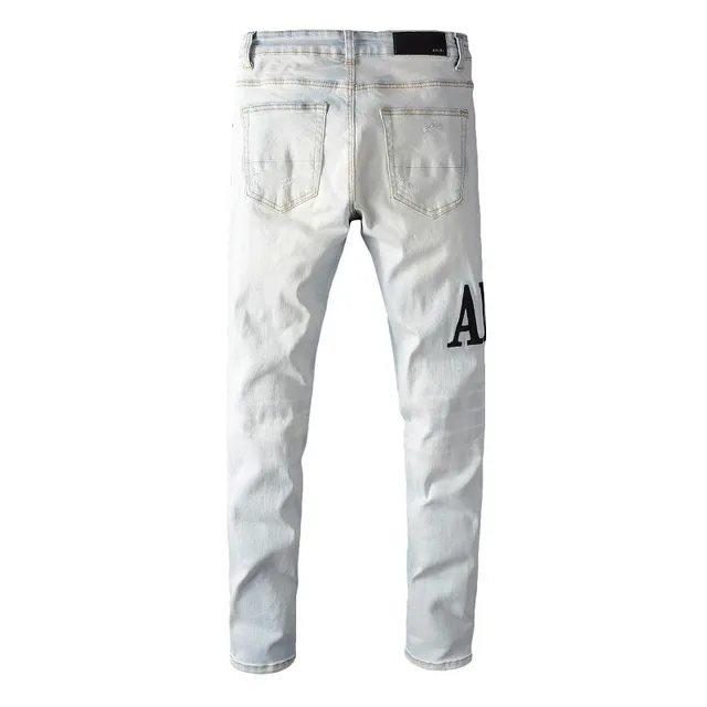 Amiri Distressed Graphic Print Light-Wash Slim-Fit Jeans 2