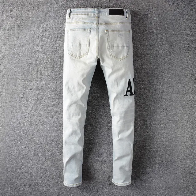 Amiri Distressed Graphic Print Light-Wash Slim-Fit Jeans 3