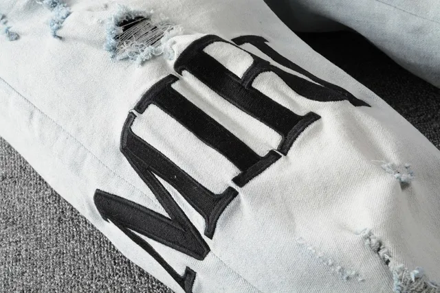 Amiri Distressed Graphic Print Light-Wash Slim-Fit Jeans 6