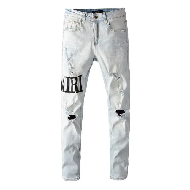 Amiri Distressed Graphic Print Light-Wash Slim-Fit Jeans 11