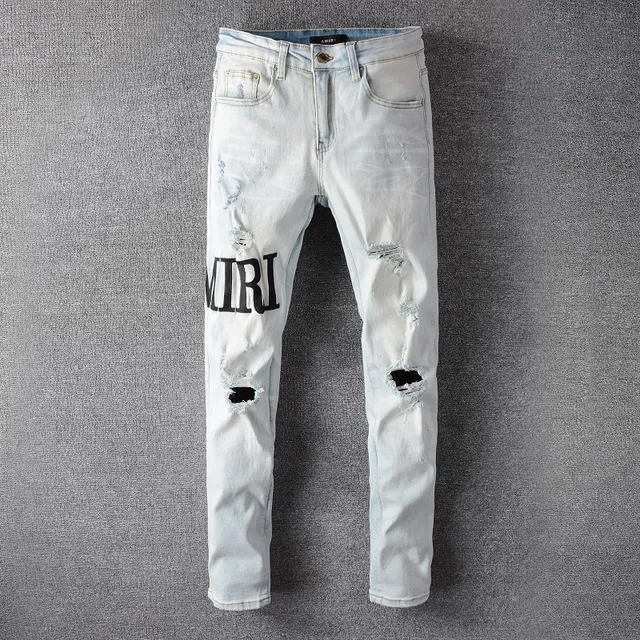 Amiri Distressed Graphic Print Light-Wash Slim-Fit Jeans 12