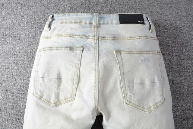 Amiri Distressed Graphic Print Light-Wash Slim-Fit Jeans 17