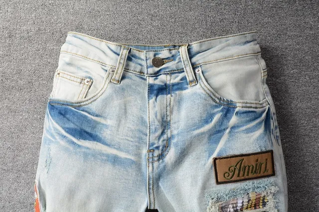 Amiri Patchwork Distressed Light-Wash Slim-Fit Jeans 7