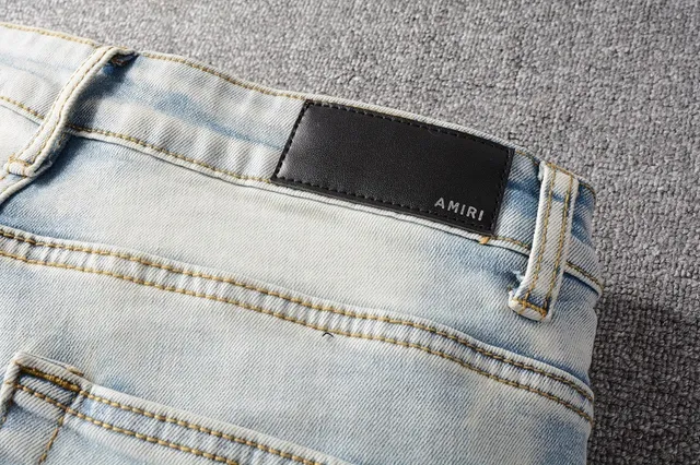 Amiri Patchwork Distressed Light-Wash Slim-Fit Jeans 12