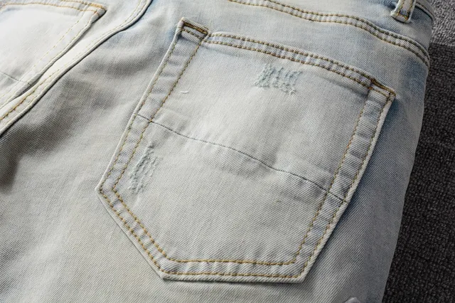 Amiri Patchwork Distressed Light-Wash Slim-Fit Jeans 13