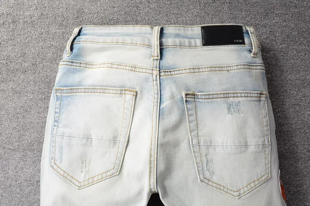 Amiri Patchwork Distressed Light-Wash Slim-Fit Jeans 14