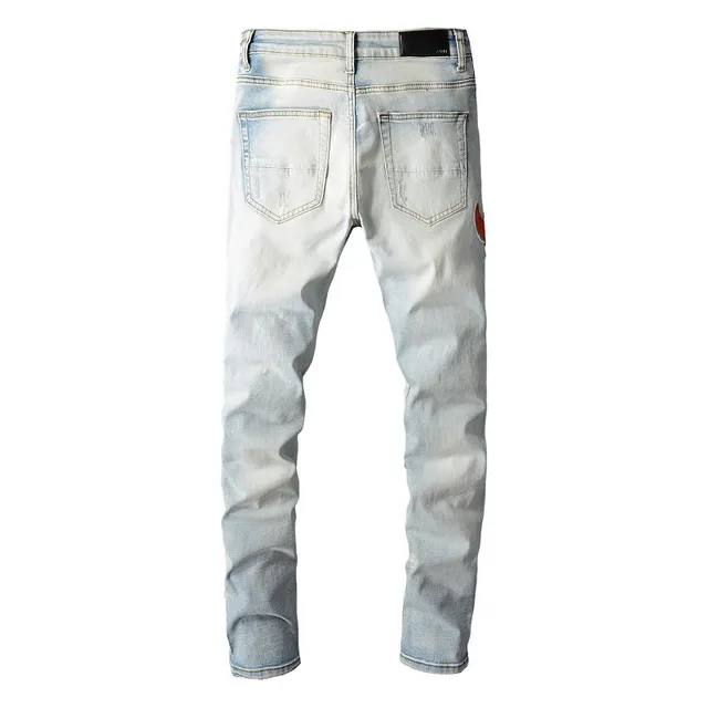 Amiri Patchwork Distressed Light-Wash Slim-Fit Jeans 15