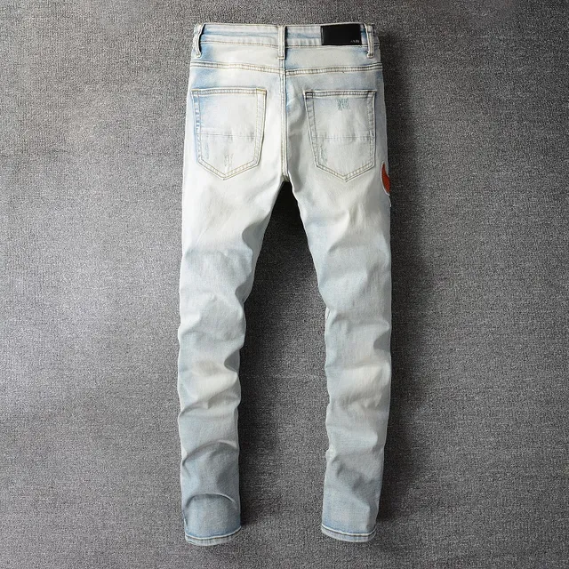 Amiri Patchwork Distressed Light-Wash Slim-Fit Jeans 16