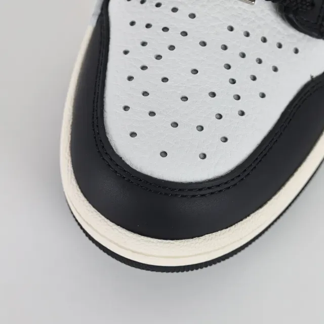 Amiri Skel Top Low Black and White Lifestyle Sneakers 5