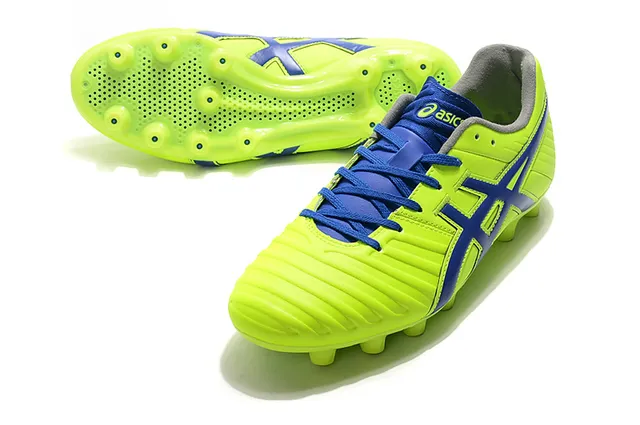 ASICS Blanc Or Chaussures de football à coupe basse supérieure en synthétique superposée de rayures de tigre sur terrain ferme 16