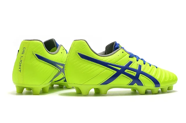 ASICS Blanc Or Chaussures de football à coupe basse supérieure en synthétique superposée de rayures de tigre sur terrain ferme 17