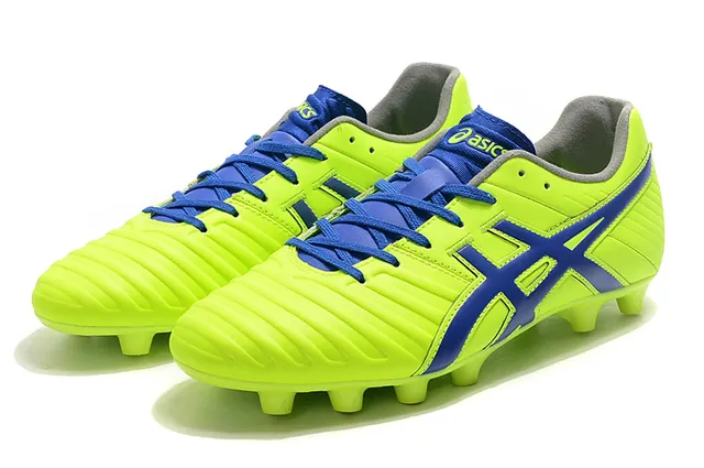 ASICS Blanc Or Chaussures de football à coupe basse supérieure en synthétique superposée de rayures de tigre sur terrain ferme 18