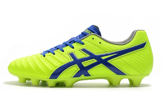 ASICS Blanc Or Chaussures de football à coupe basse supérieure en synthétique superposée de rayures de tigre sur terrain ferme 21