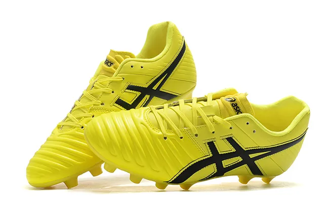 ASICS Blanc Or Chaussures de football à coupe basse supérieure en synthétique superposée de rayures de tigre sur terrain ferme 22