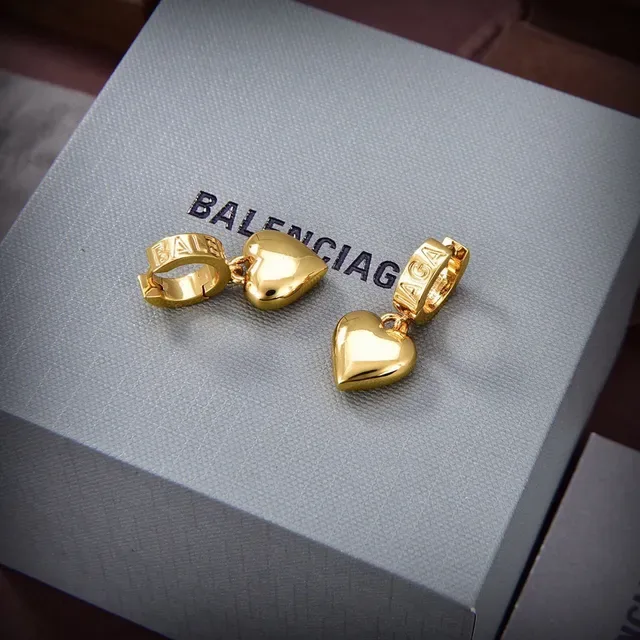 Balenciaga أقراط تعليقات قلب ذهبية فضية منحوتة إغلاق أسطواني 4