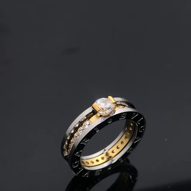 Bvlgari B.zero1 Silver Gold Stacked Multi-Band Engraved Logo Ring 4