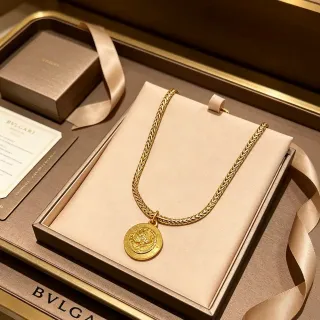 Bvlgari Gold Braided Chain Dragon Medallion Necklace