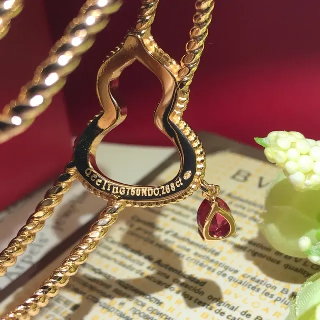 Bvlgari Bracelet chaîne corde tordue dorée pendentif cœur rouge 5