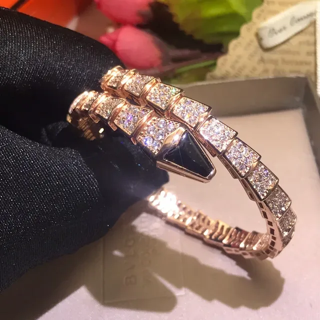 Bvlgari Serpenti سوار الماس الباڤيه والأونيكس الدوار 6