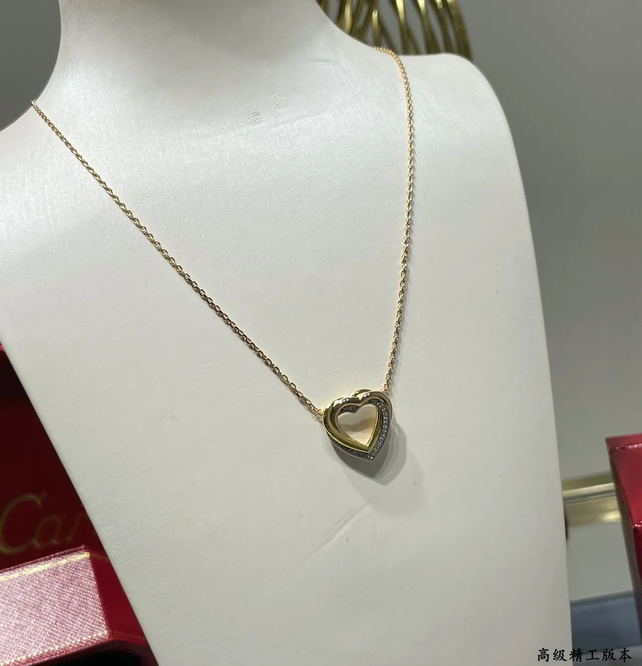 Cartier Love Collier pendentif double-cœur en or noir ajouré de deux tons 3
