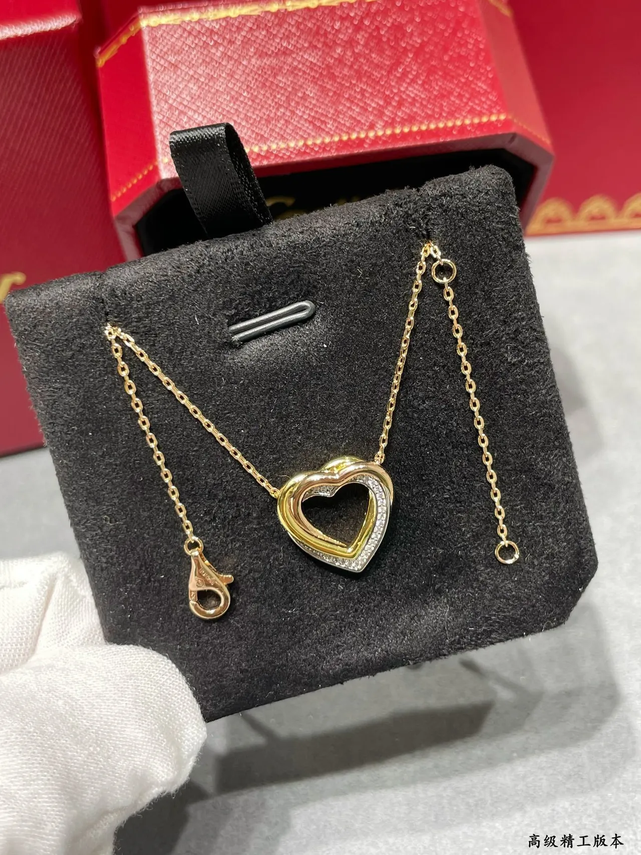 Cartier Love Collier pendentif double-cœur en or noir ajouré de deux tons 4