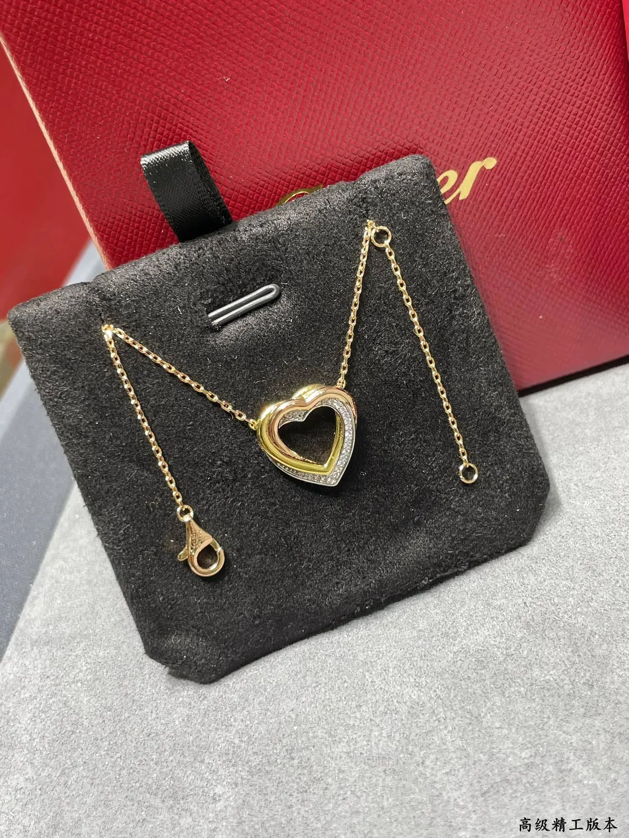 Cartier Love Collier pendentif double-cœur en or noir ajouré de deux tons 7