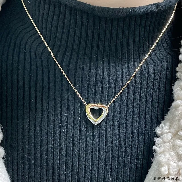 Cartier Love Collier pendentif double-cœur en or noir ajouré de deux tons 9