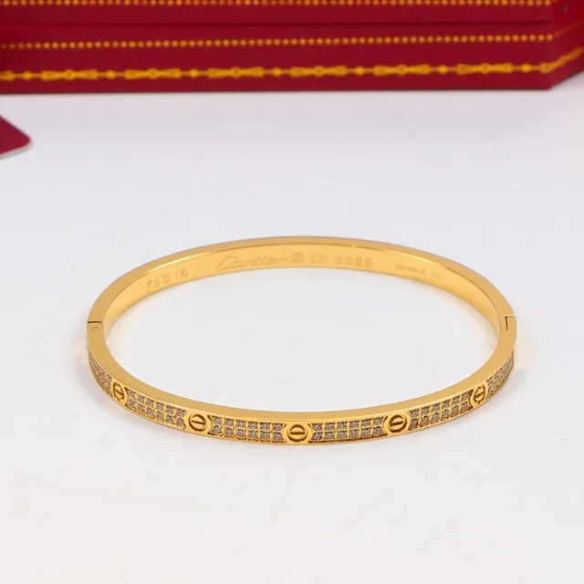 Cartier Love Bracelet à charnière en or et argent orné de pierres pavé 4