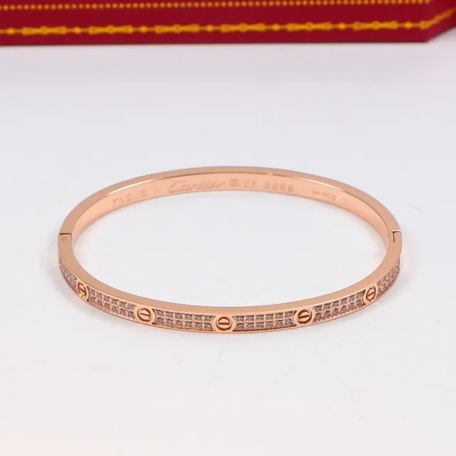 Cartier Love Bracelet à charnière en or et argent orné de pierres pavé 5