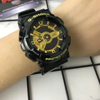 Casio G-Shock GA-100 Black and Gold Sports Watch