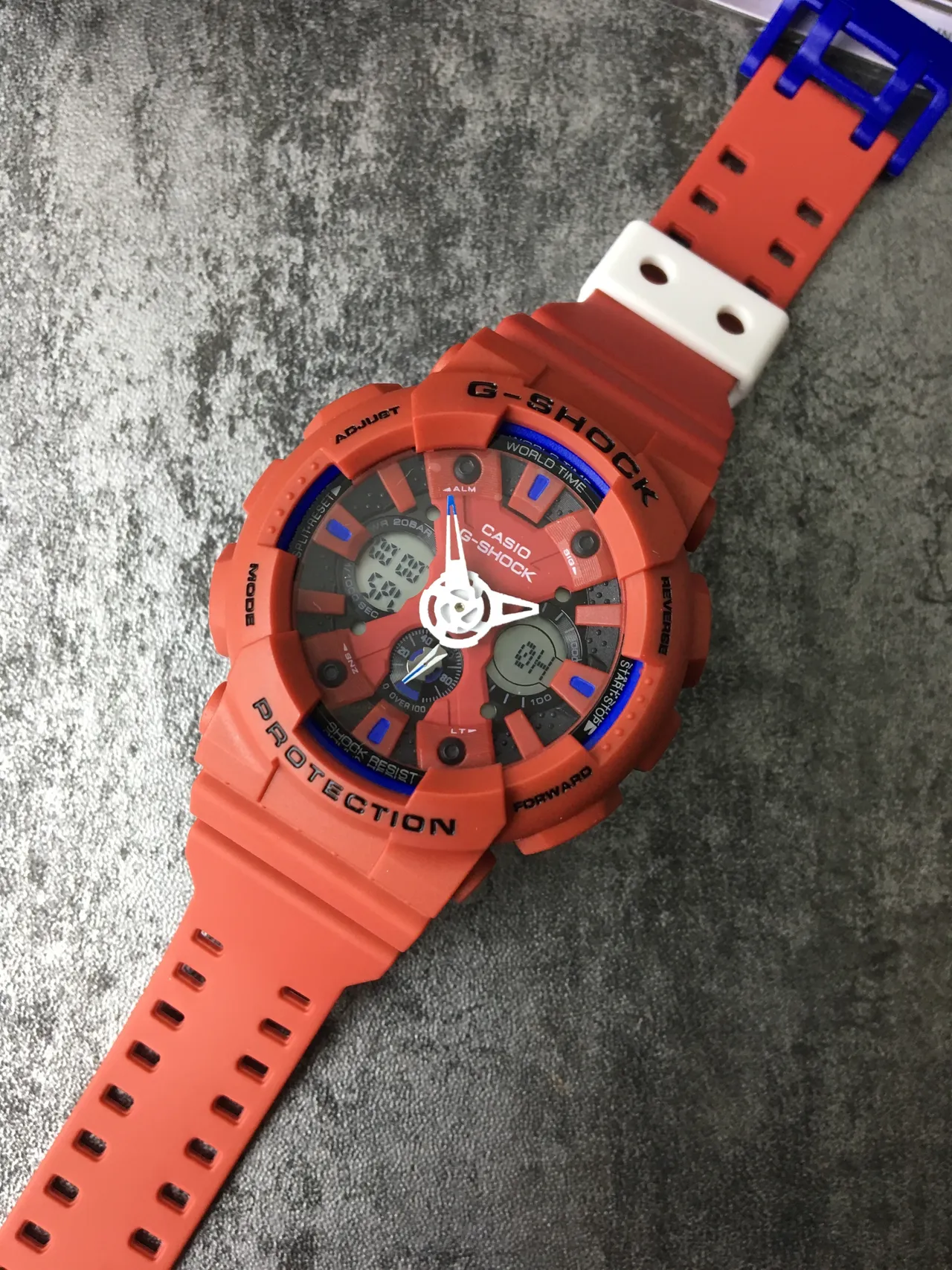 Casio G-Shock GA-100 Orange et Bleu montre sportive 5