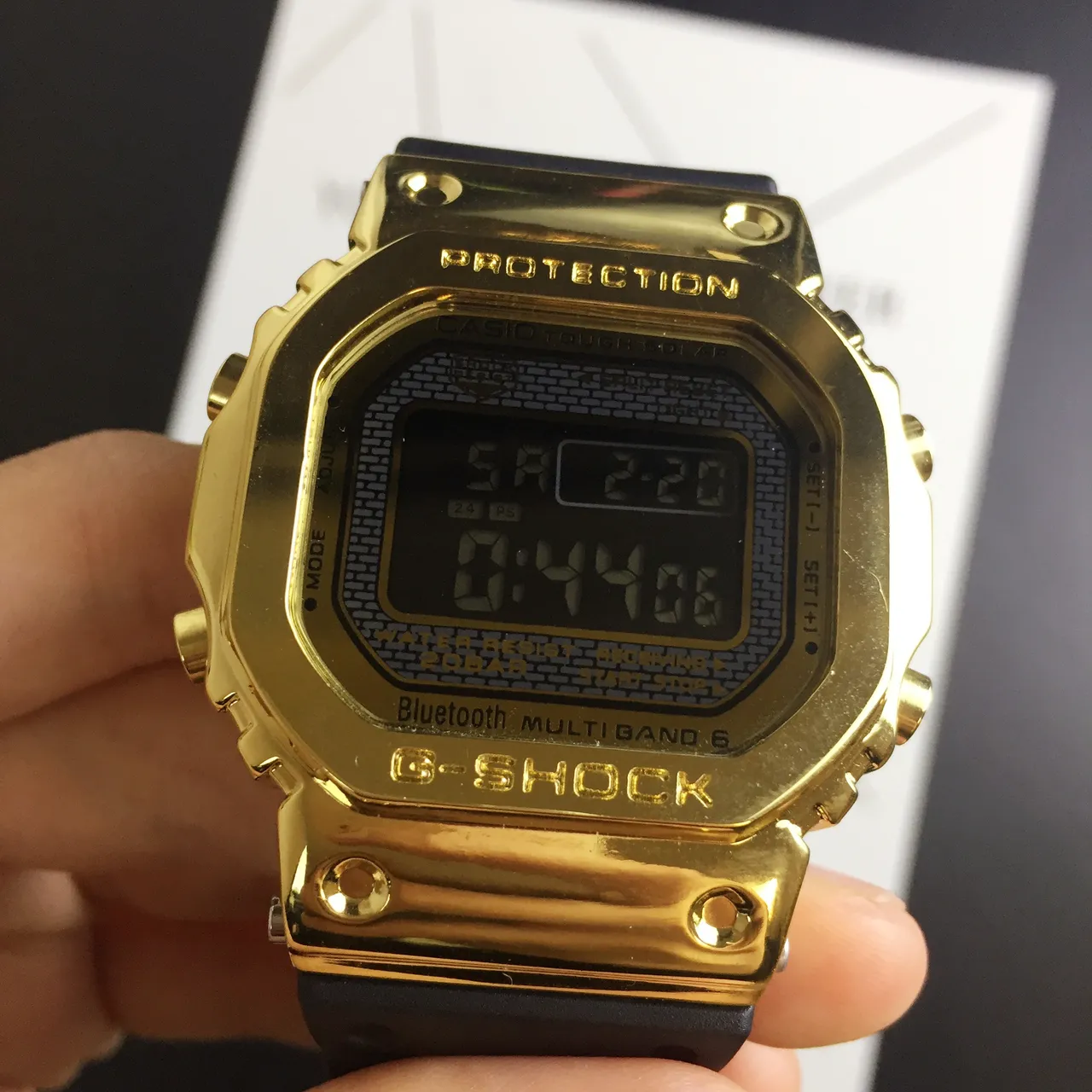 Casio G-Shock GA-2100 Montre sportive dorée et noire 4