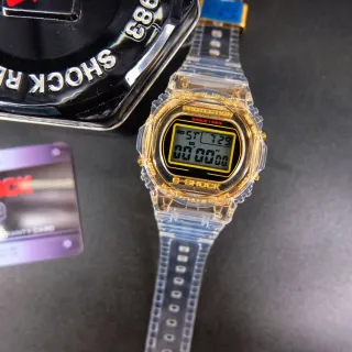 Casio G-Shock Montre sportive en résine transparente avec accent doré