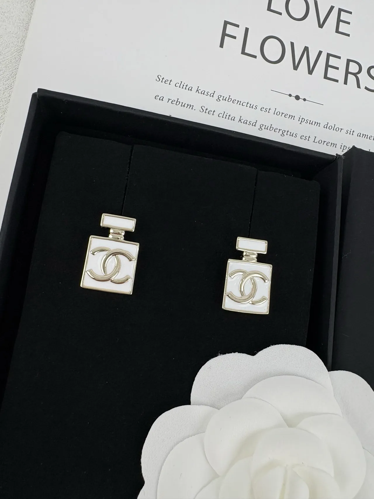 Chanel Perfume Bottle White Silver Silhouette Enamel Finish Earrings 6
