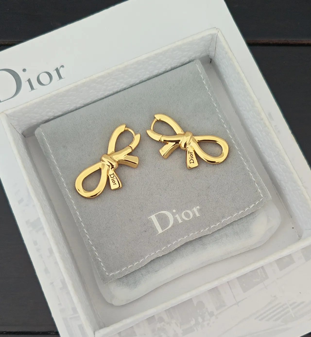 Dior Bow Gold Gray Silhouette Polished Metal Finish Earrings 3