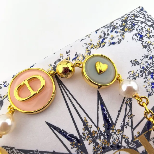 Dior D-Luck Multicharm Gold-Tone Resin and Pearl Bracelet 3