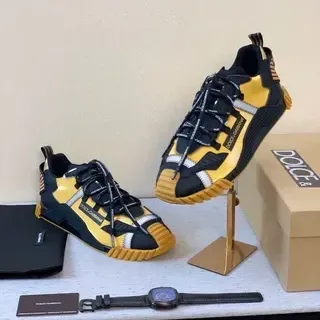 Dolce & Gabbana Black Yellow Sculpted Ridged Sole Layered Synthetic Overlays Lifestyle Sneakers